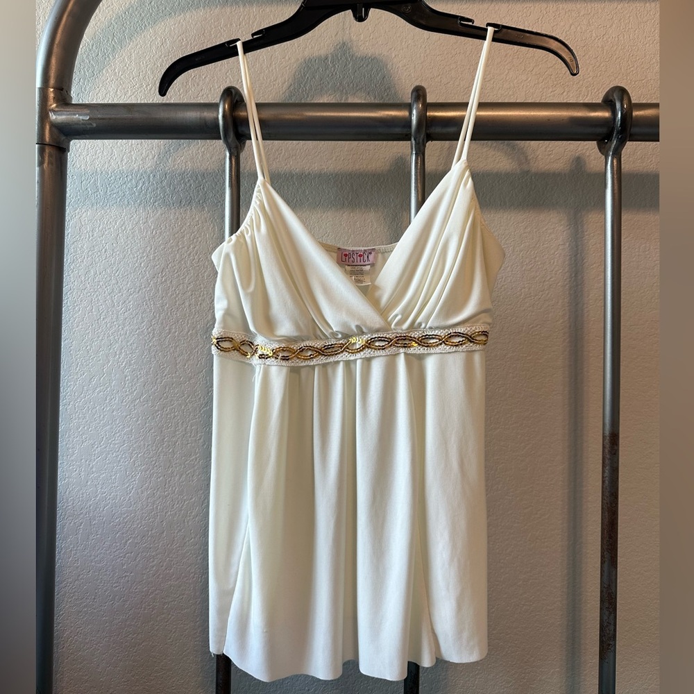 Cream and gold take top
